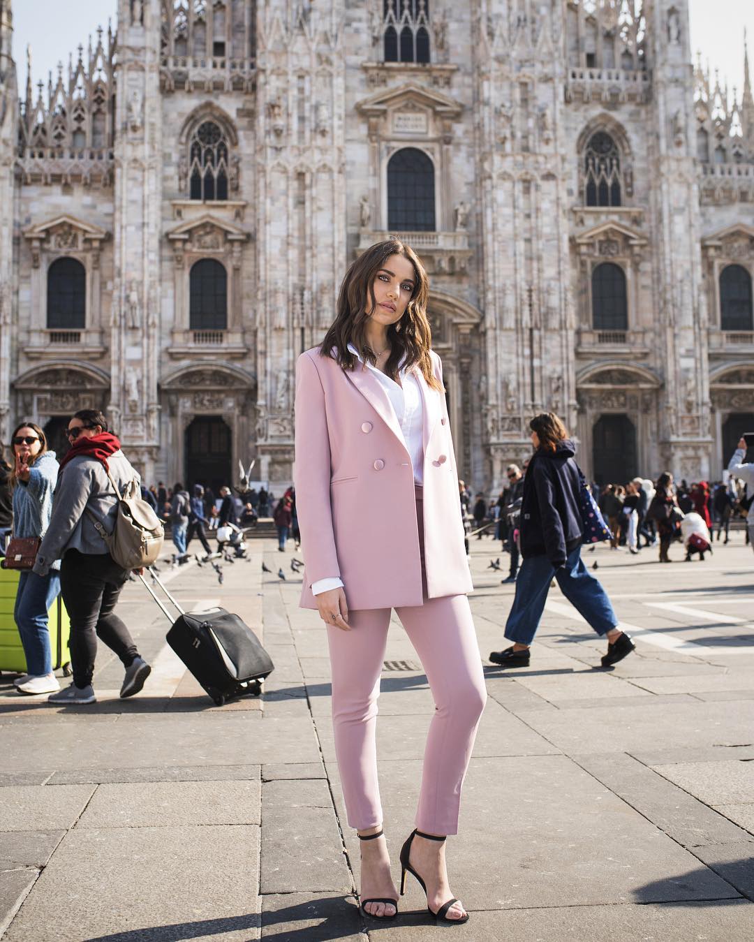 Dorra Zarrouk Paired Her Hot Pink Pantsuit With Comfy Sneakers for